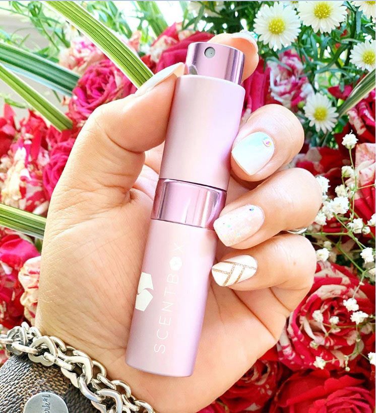 Flatlay of various designer perfume brands available on ScentBox